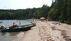 Not only is Lake Willoughby a beautiful pristine lake, our cottage rests adjacent to a stretch of white sand that makes for an idyllic setting.